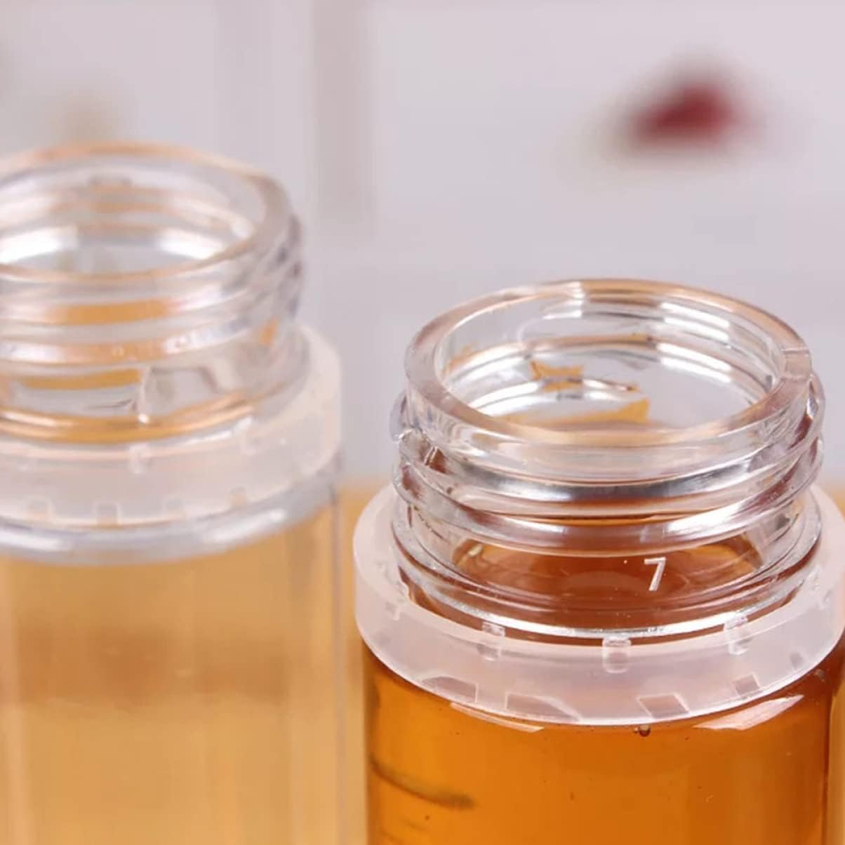ASAKKURA 4 Pack PVC Honey Storage Bottles with Sealed Lid